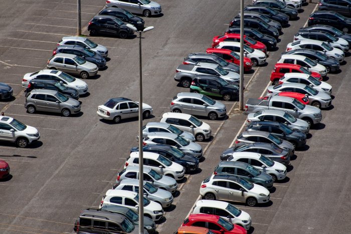 In a parking lot with 200 cars